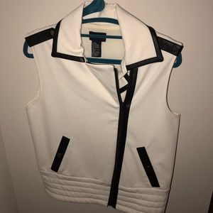 White vest with black leather lining detail